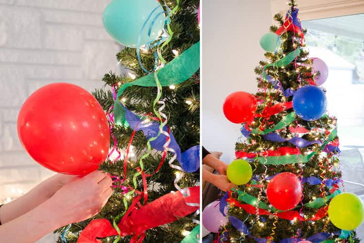 someone putting balloons on christmas tree and tree with streamers