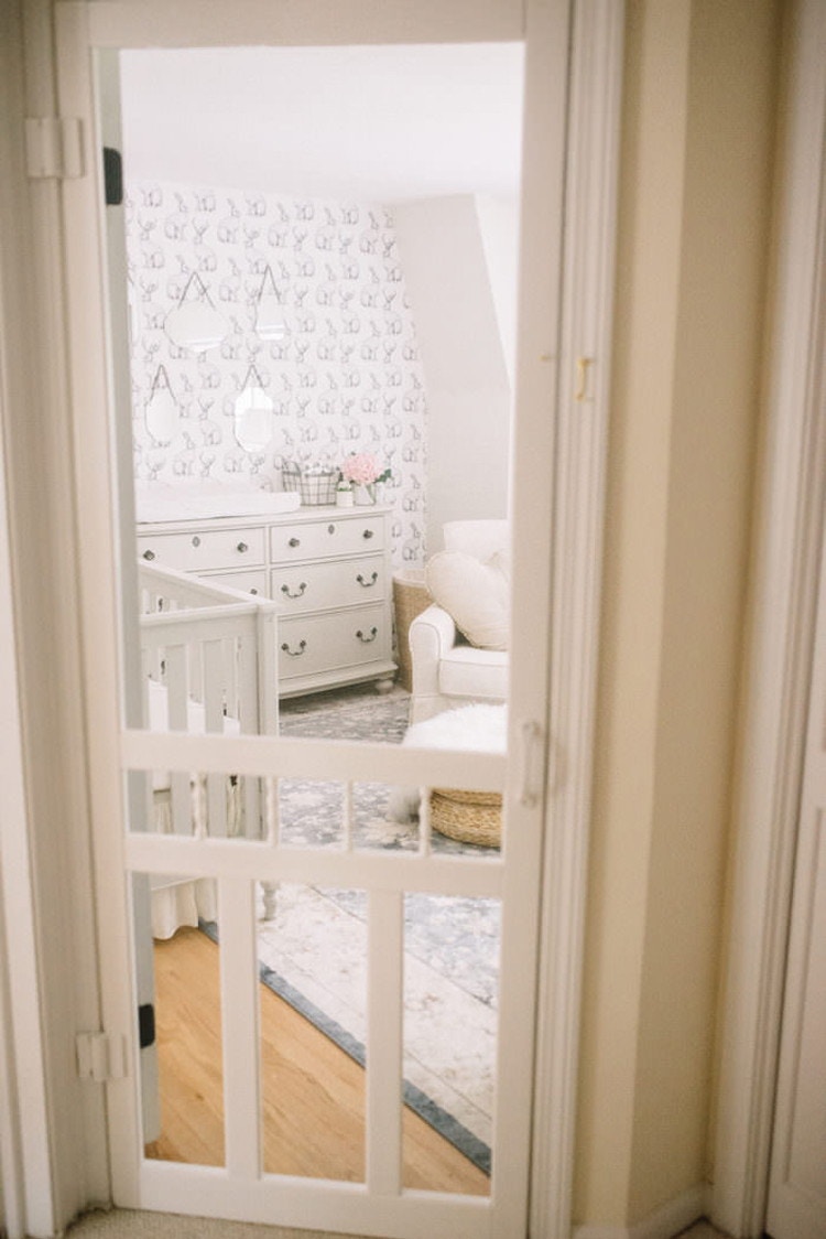 Keep pets out of the nursery with a screen door.