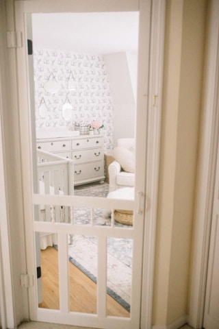 Keep pets out of the nursery with a screen door.