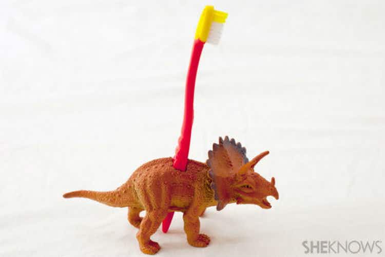 turn a toy dinosaur into a toothbrush holder.