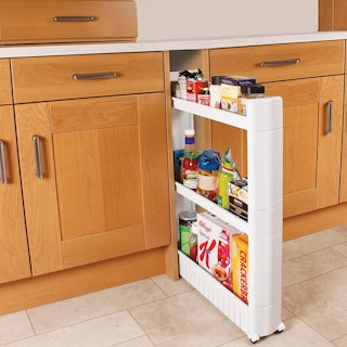 Fill narrow, empty spaces with a slide-out storage towers.