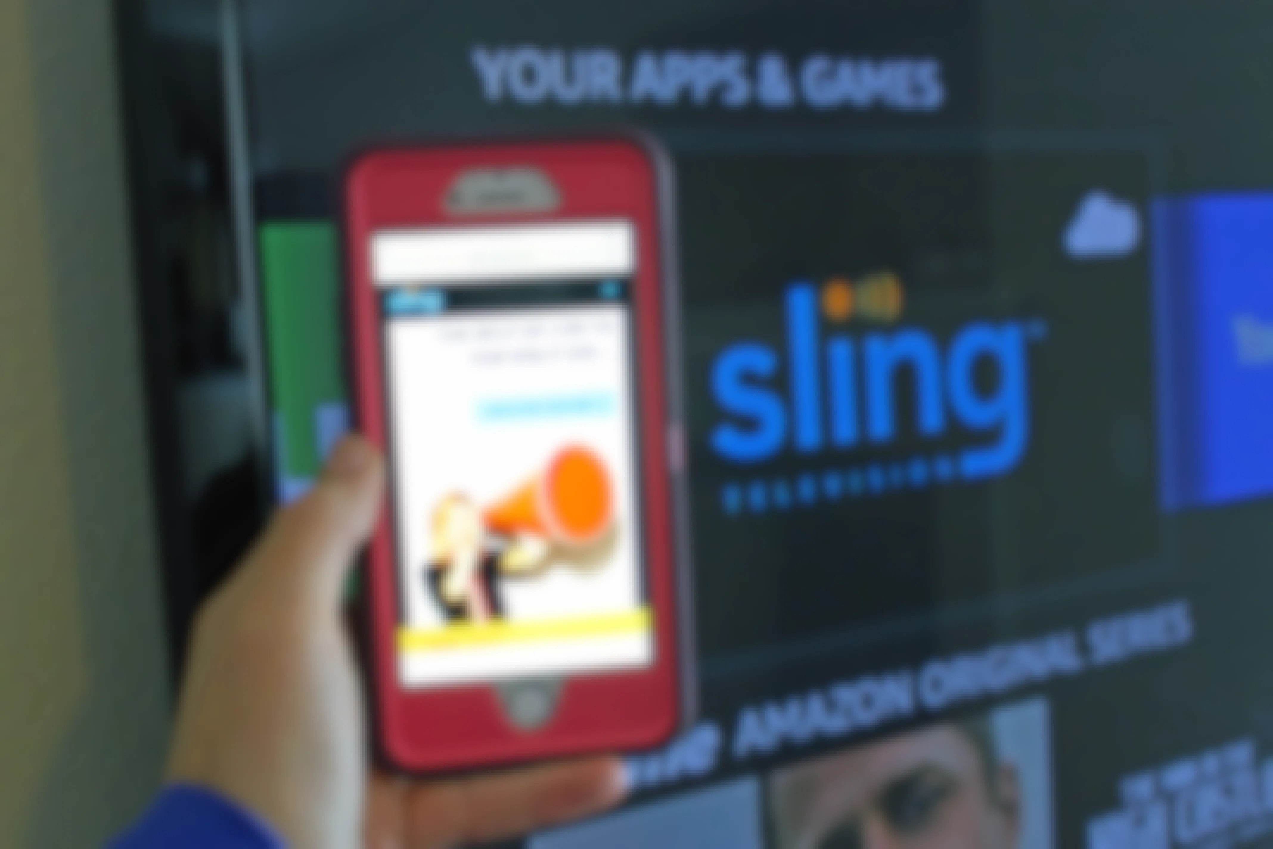 Sling TV channels deal shown on a phone screen near television