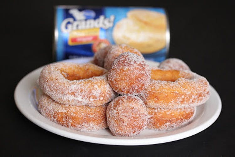 Make donuts out of canned biscuit dough.