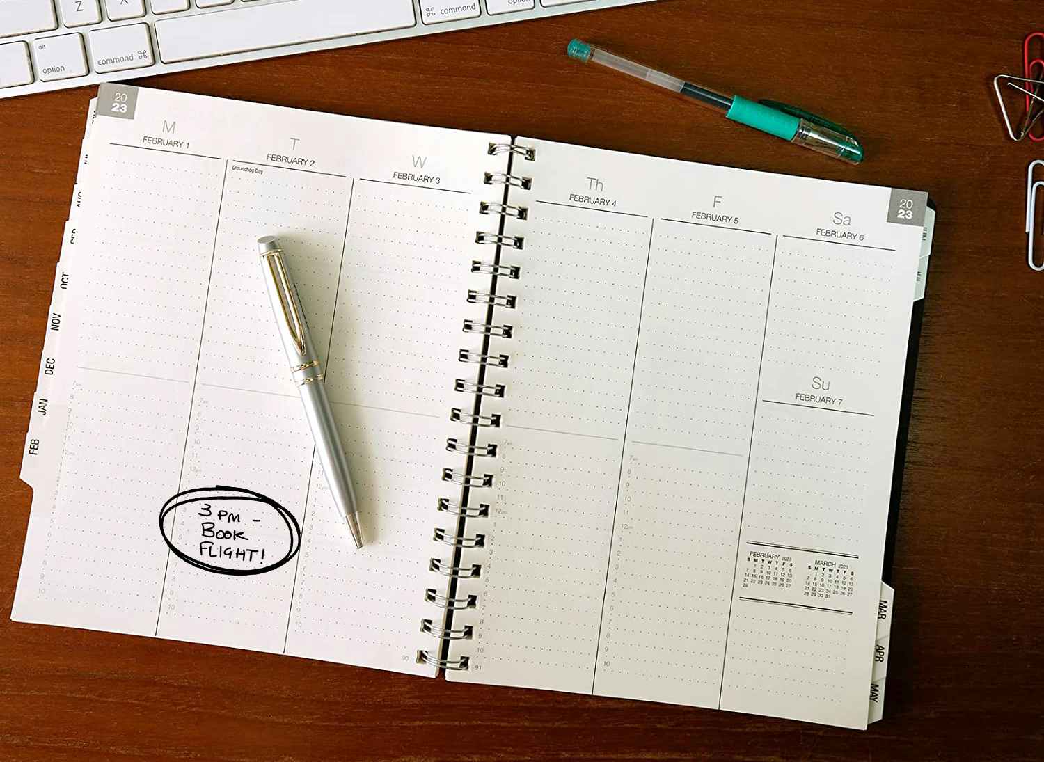 weekly planner with reminder on Tuesday to book flight