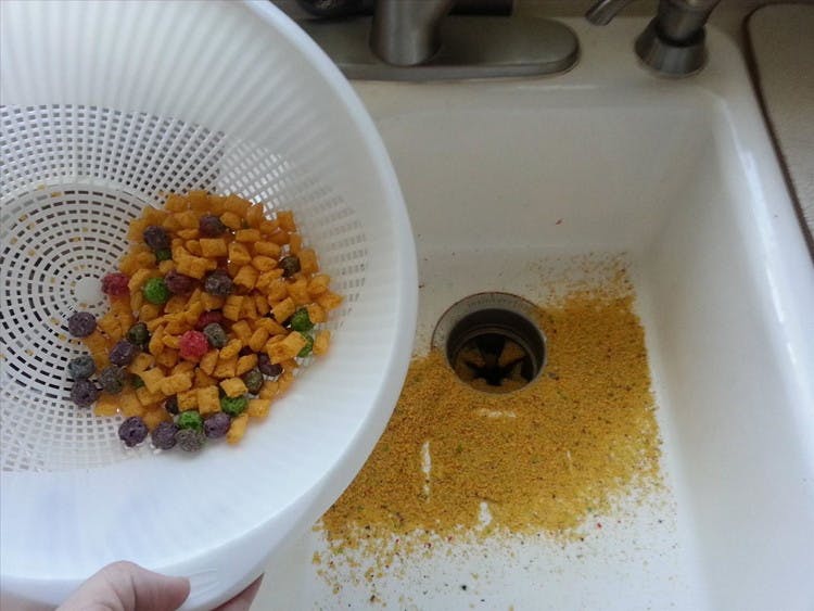 Get rid of unwanted cereal crumbs with a strainer.