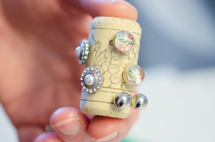 Use a wine cork to keep earrings together