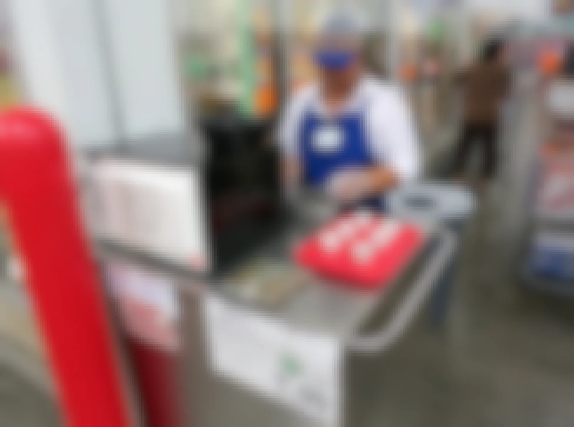 Costco free samples vendor preparing samples in the frozen food aisle