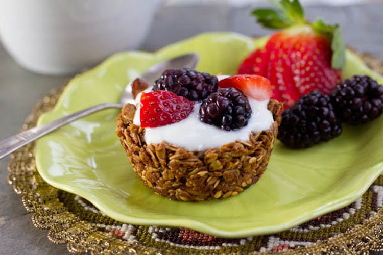 Use a muffin tin to make granola cups for your yogurt.