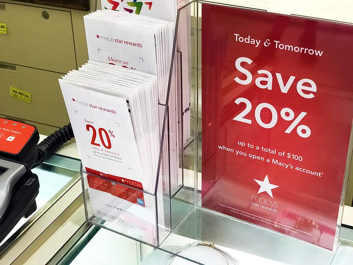 macys save 20% signage for credit card