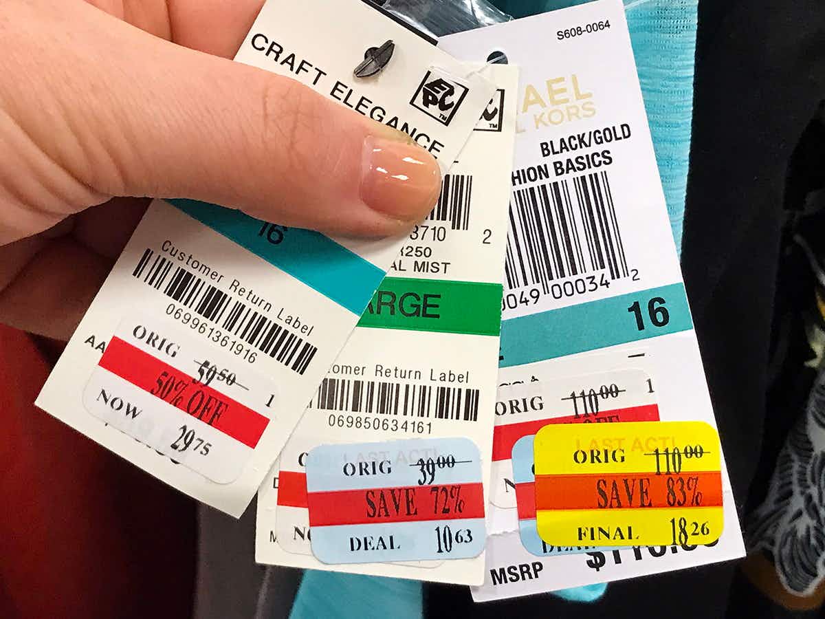 a picture showing Macy's clearance tags in all three different colors