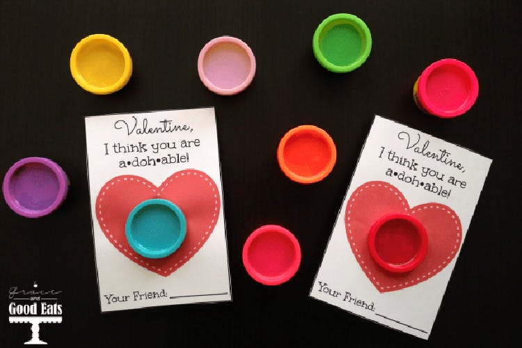 A Valentine's Day craft for kids using Play-Doh and printable cards