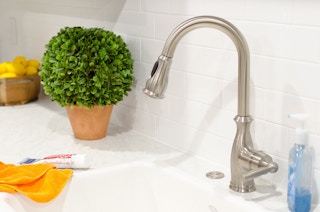 Clean and shine a sink.