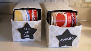 Store canned goods in old soda-can boxes.