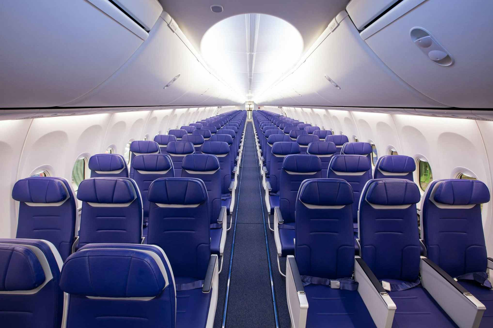empty blue seats on Southwest Airline plane
