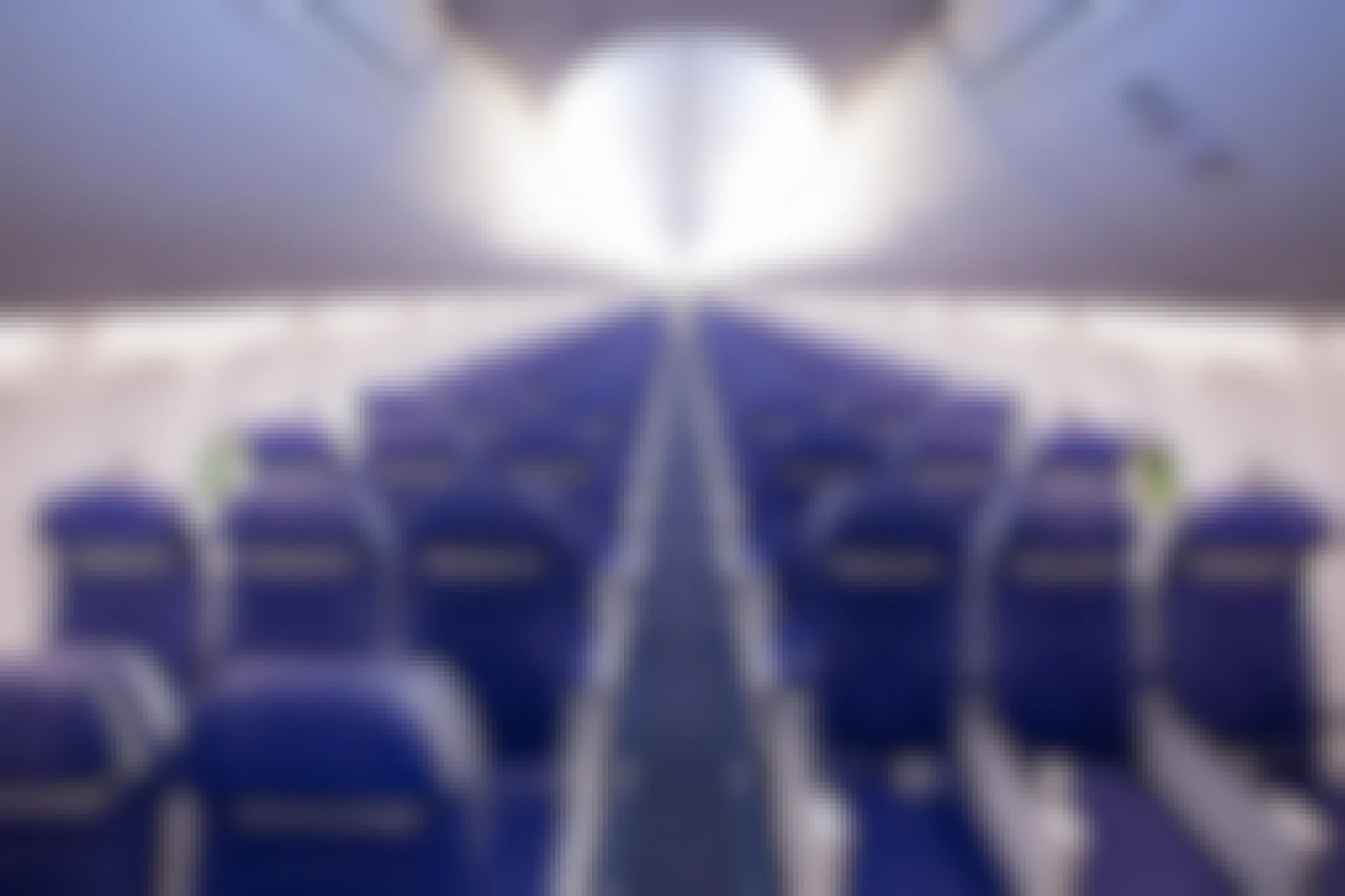 empty blue seats on Southwest Airline plane