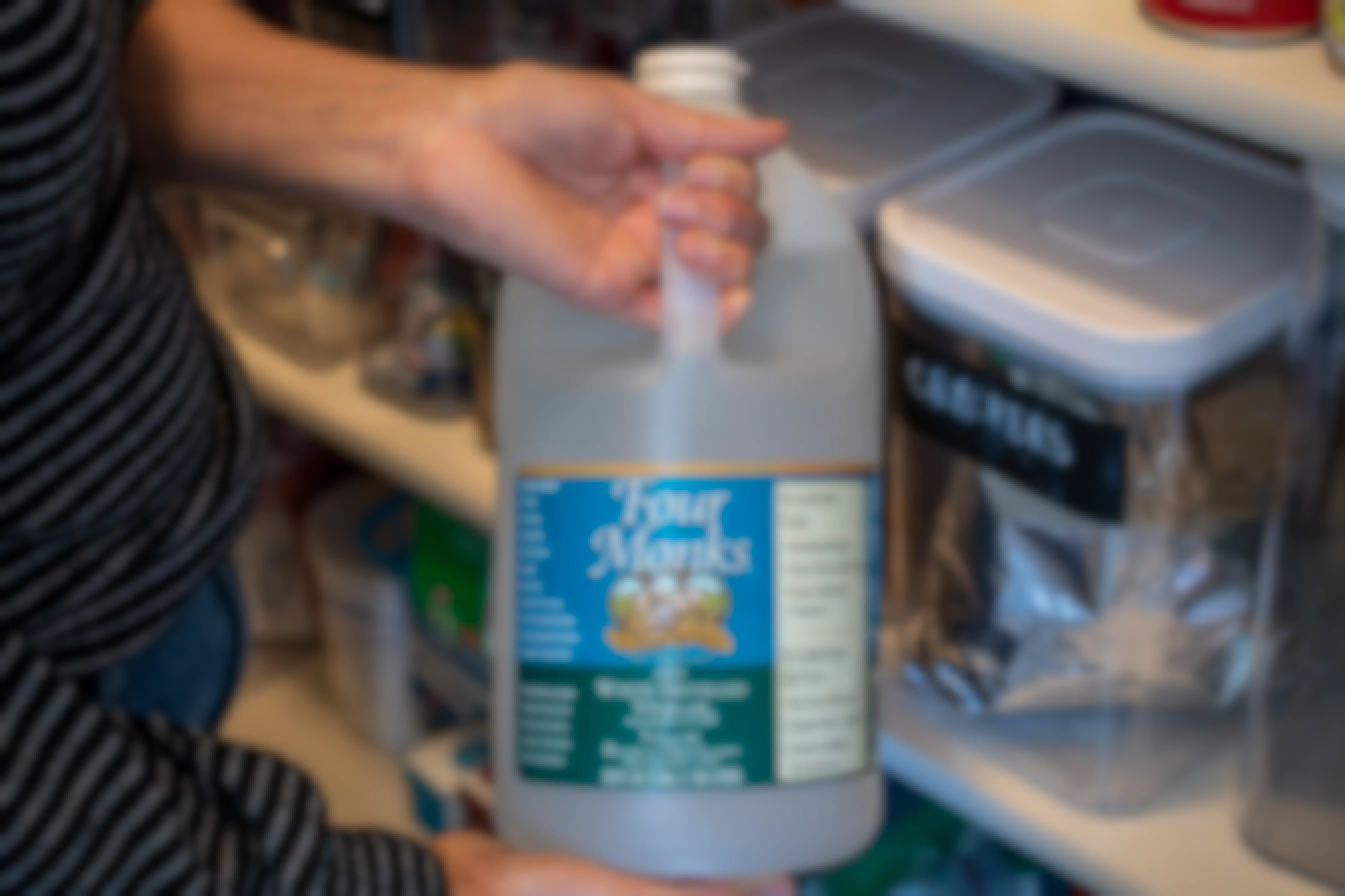 A bottle of white vinegar in a pantry