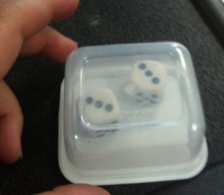Shake dice in a tiny container so they don't get lost.