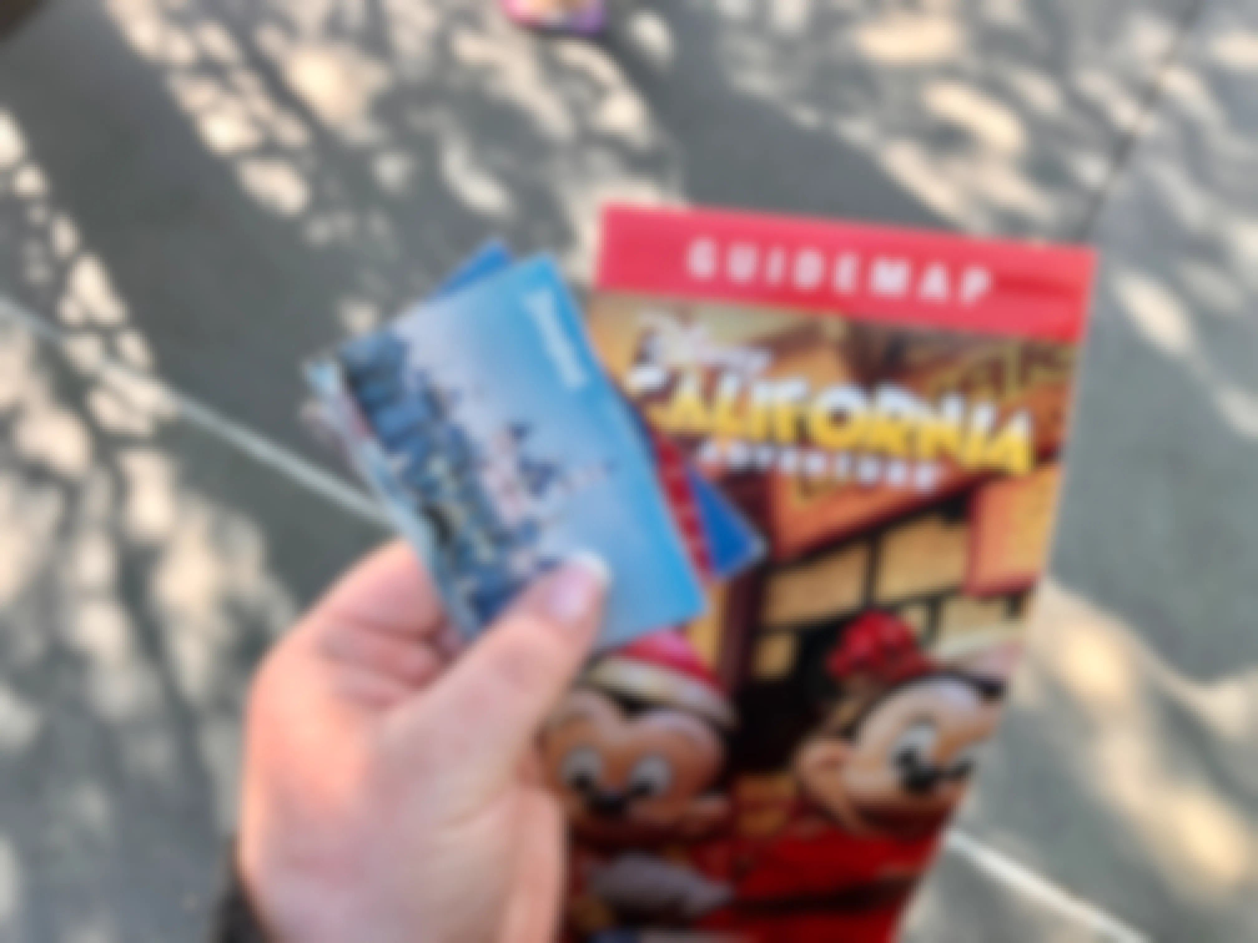 Disneyland tickets with a California adventure park map.