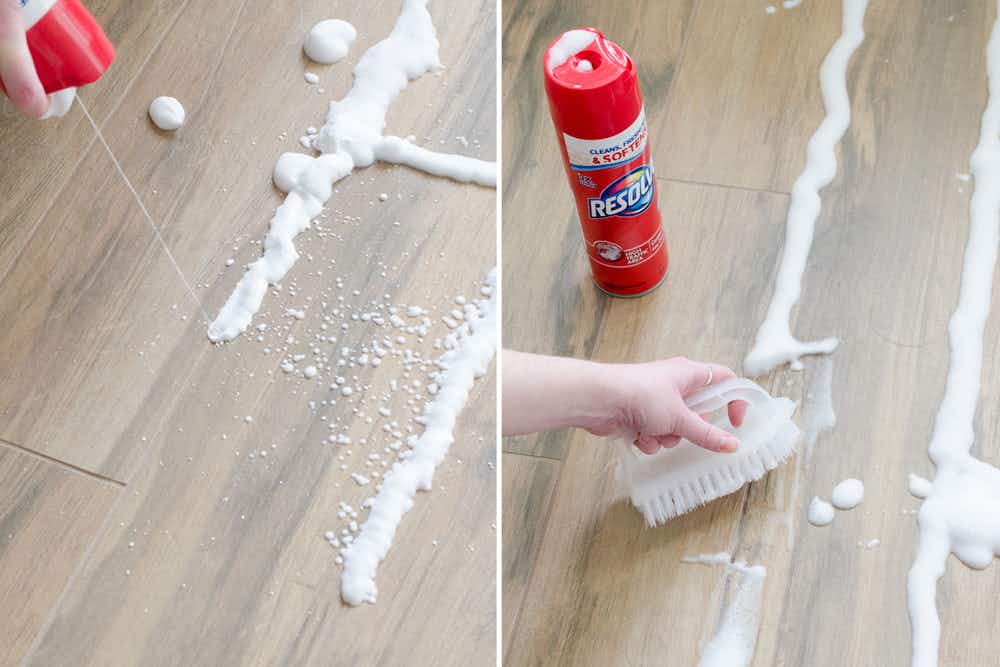 Use Resolve carpet cleaner to clean the grout between floor tiles.