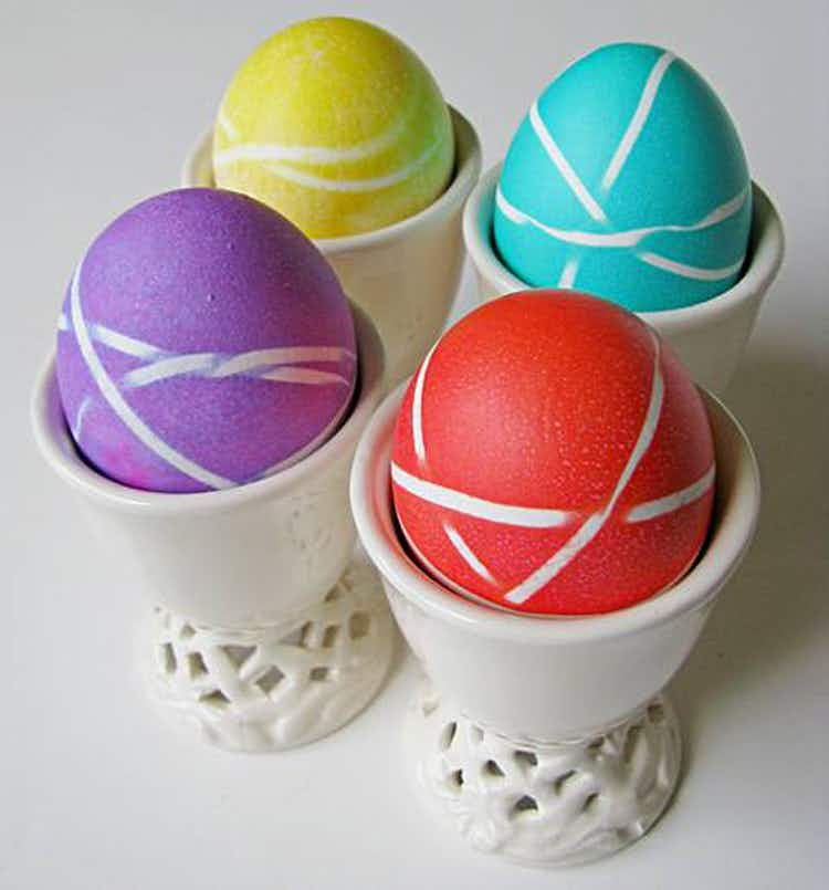 Wrap eggs in rubber bands before dipping in dye for a cool stripe effect.