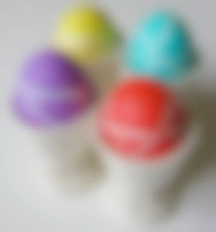 Wrap eggs in rubber bands before dipping in dye for a cool stripe effect.