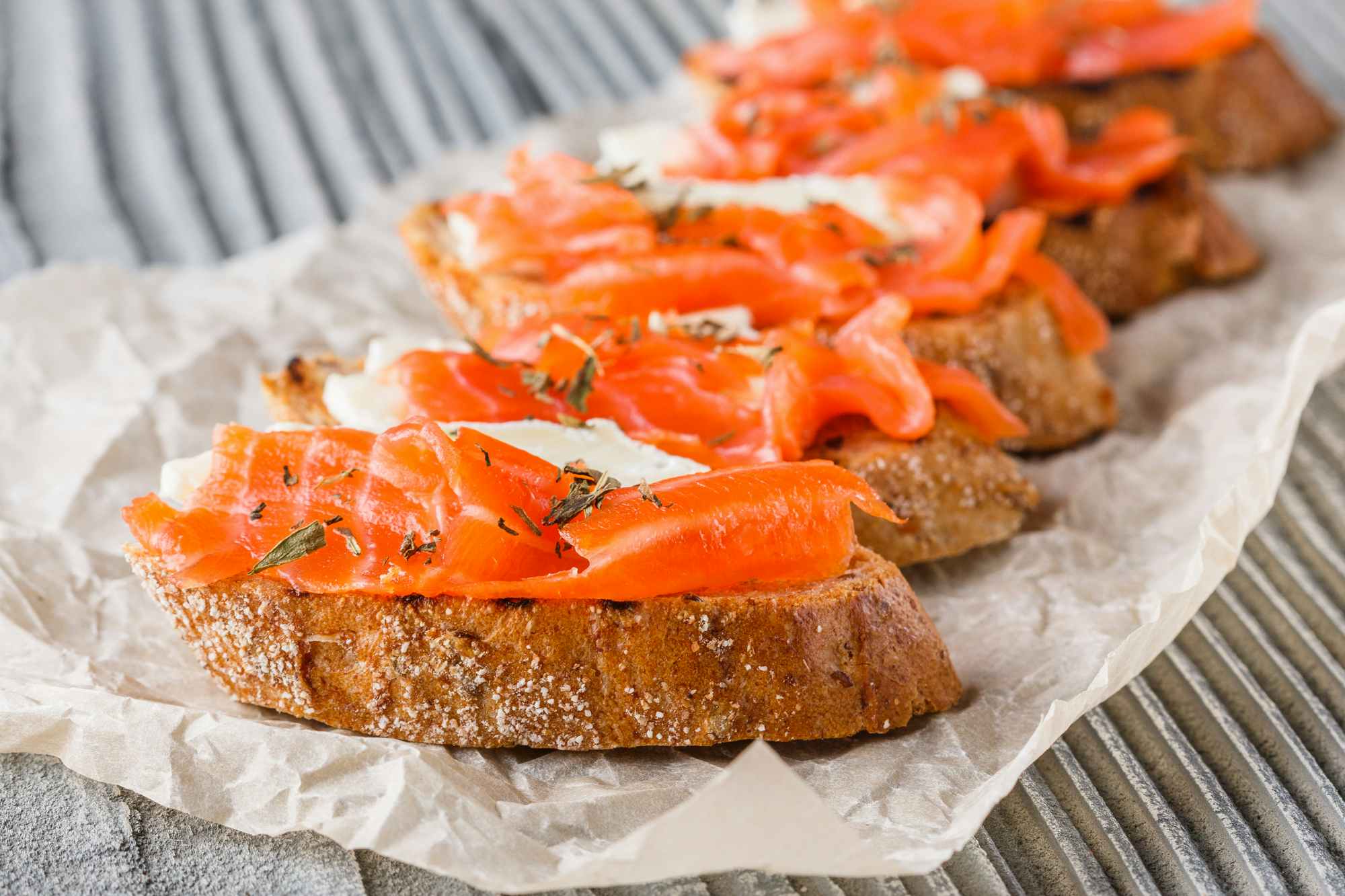Slices of bread topped with smoked salmon