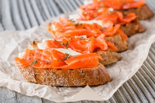 Slices of bread topped with smoked salmon