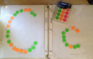 Help younger kids learn the alphabet with a sticker binder.