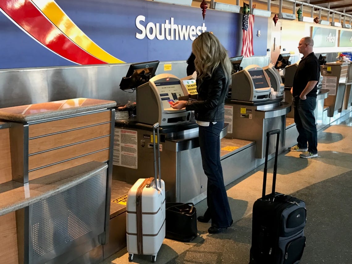 woman at a Southwest Airlines ticket counter