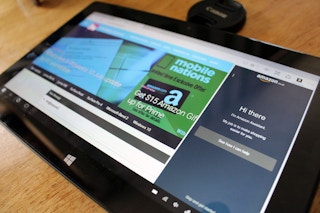 Someone using amazon assistant on their laptop