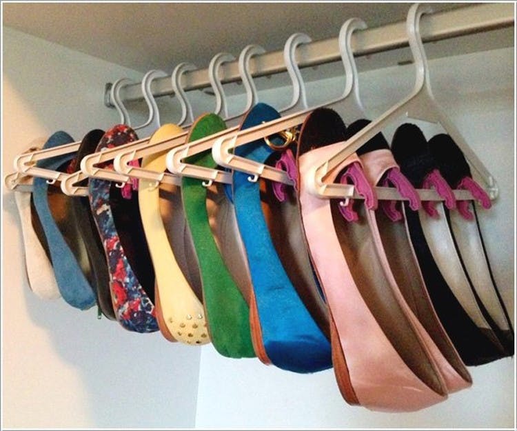 Attach clothespins to hangers.