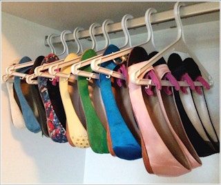 Attach clothespins to hangers.