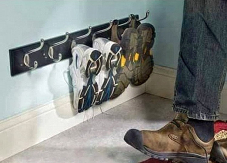 Mount coat hooks near a door.