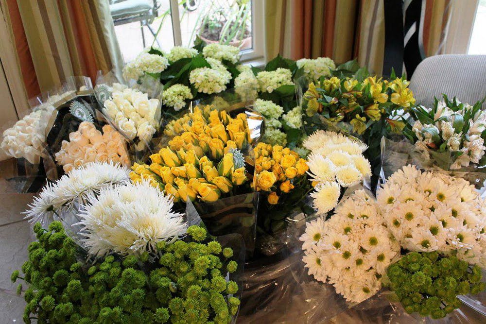 Skip the florist and buy bulk flowers from Costco or Sam's Club.