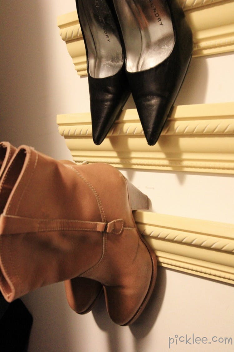 Use crown moulding to hang heels.