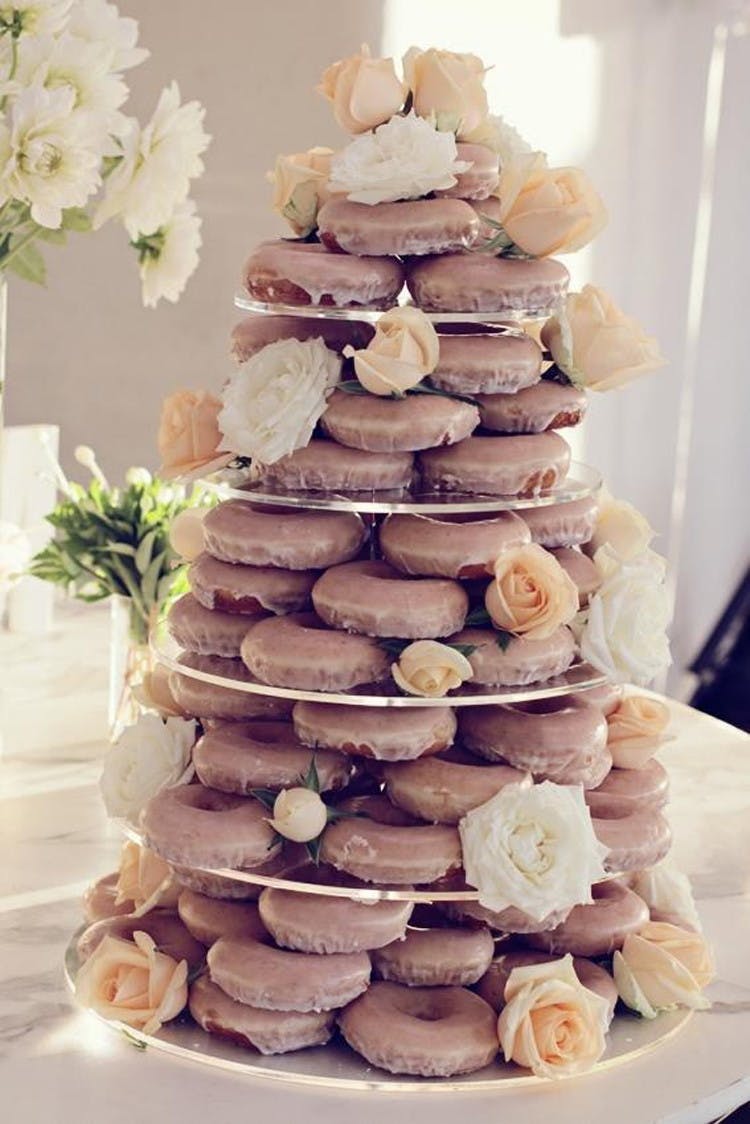 Serve donuts or chocolate covered strawberries instead of traditional wedding cake.