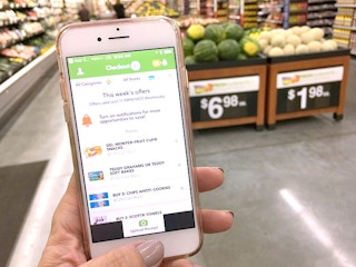 someone holding phone open with Checkout51