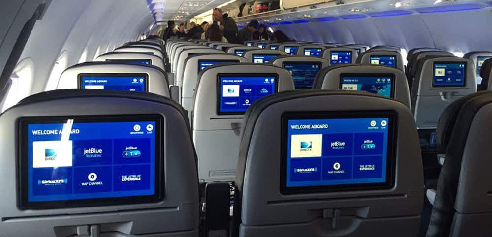 Book a seat in the rear of the plane to ensure overhead space for your carry-on.