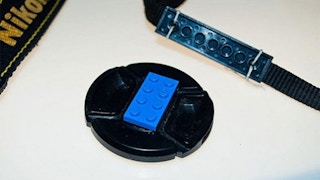 Prevent your camera's lens cap from getting lost.