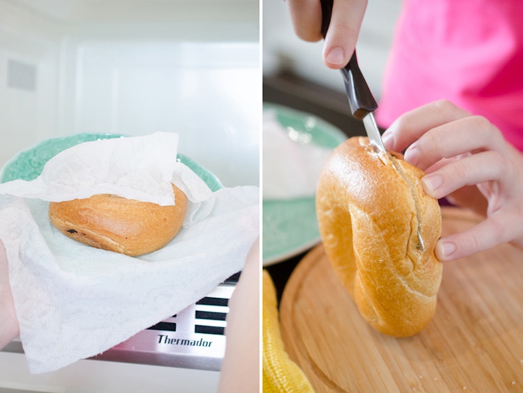 a person microwaving a bagel and then cutting it