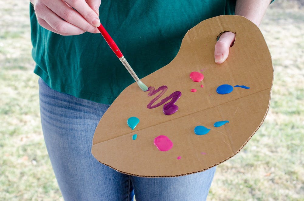 Make paint palettes with cardboard.