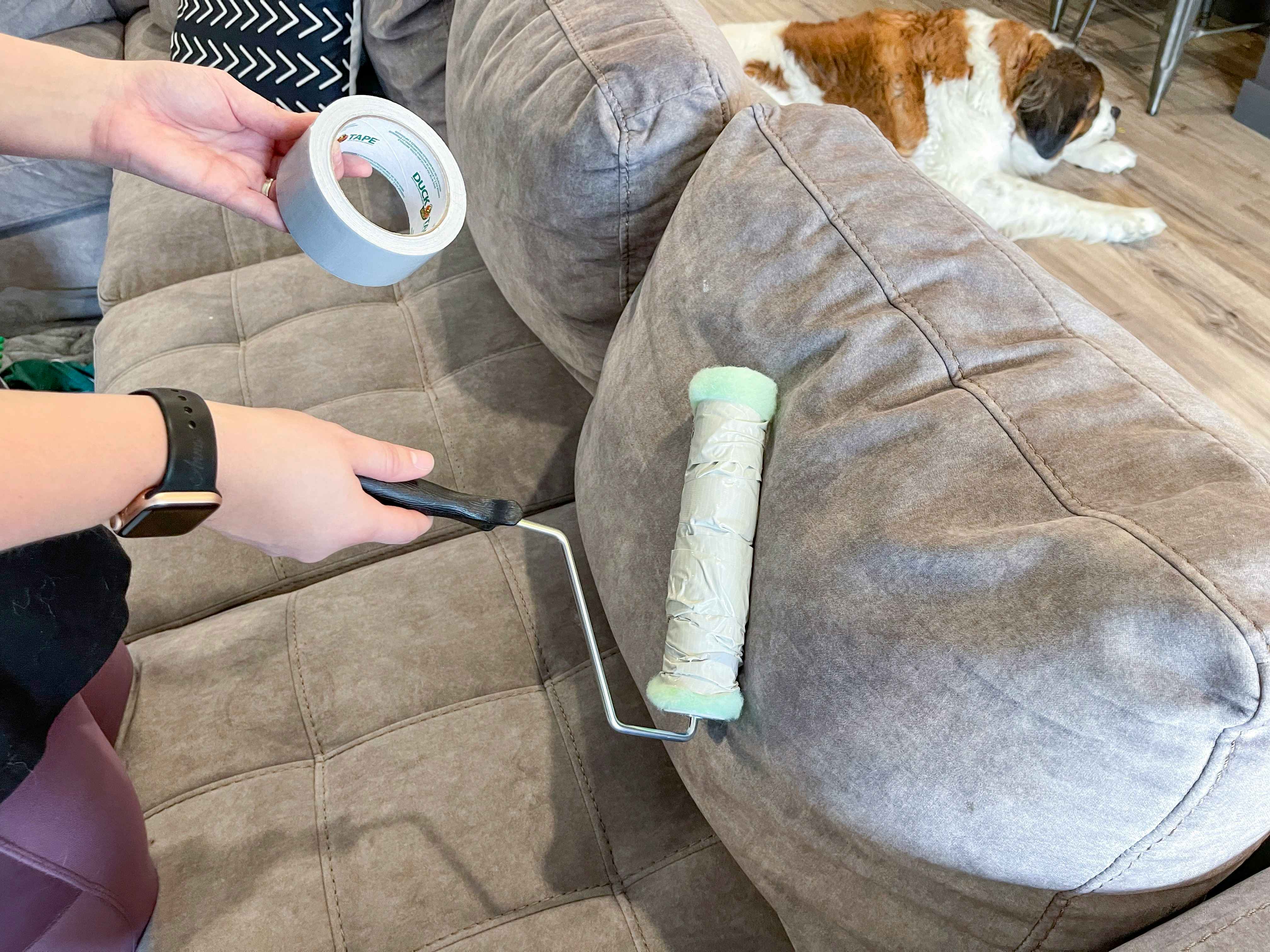 a paint roller covered in duct tape for pet hair remover