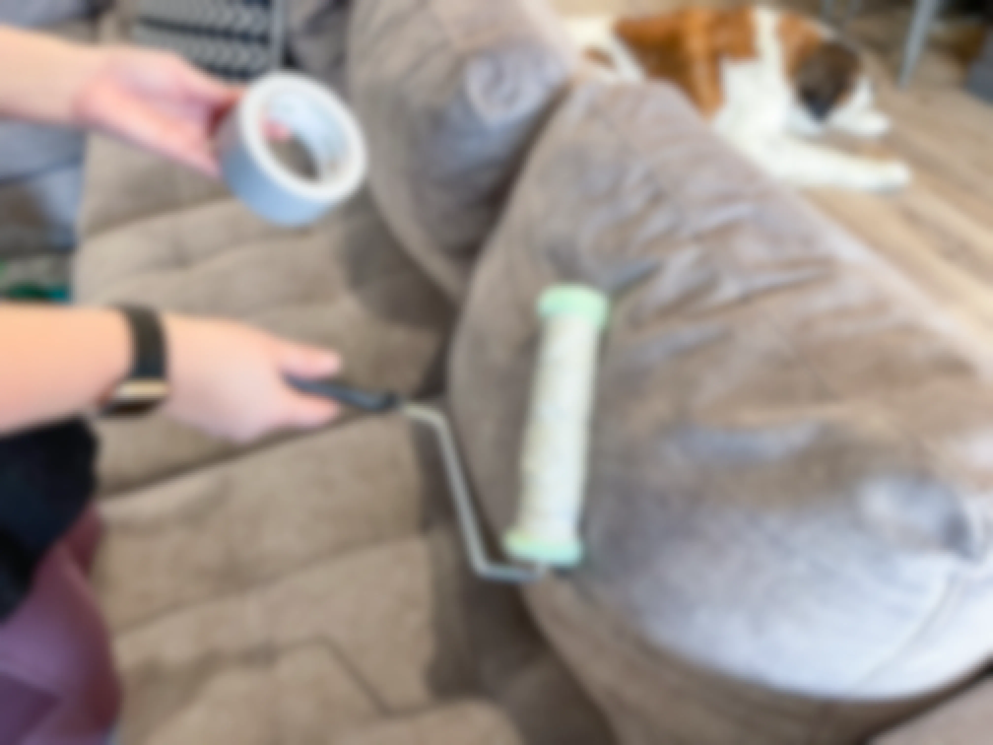 a paint roller covered in duct tape for pet hair remover
