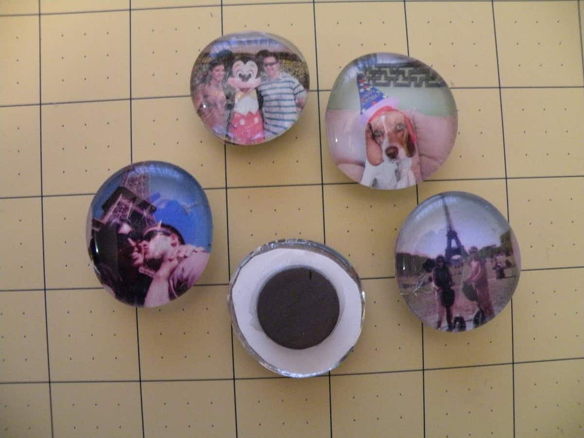 Create picture magnets out of glass gems or marbles.