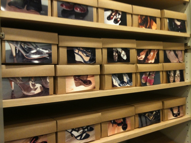 Attach photos to shoeboxes.
