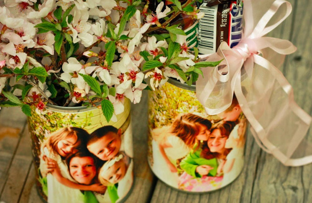 Reuse empty soup cans to make photo vases. 