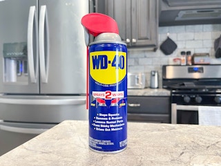 can of wd-40 on kitchen counter
