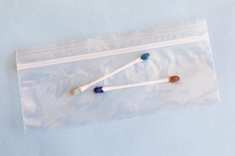 Coat cotton swabs in favorite eye shadows instead of bringing a whole palette. 