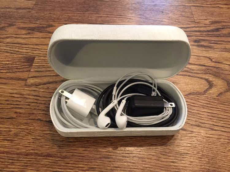 Store chargers and cords in an eyeglass case.