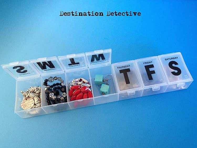 Pack jewelry in a pill case.